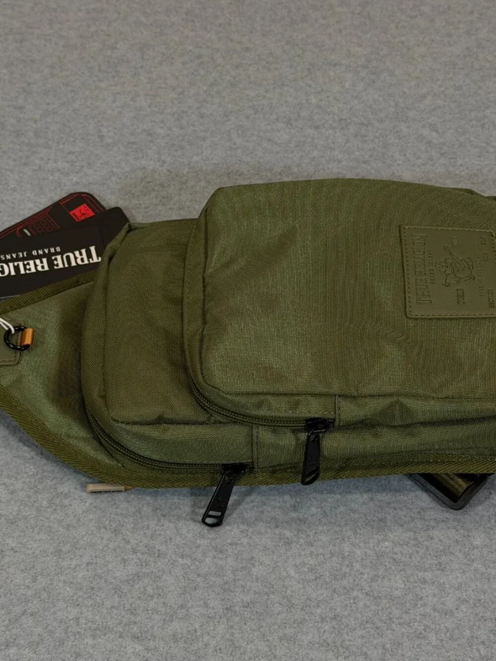 True Religion Unisex Olive Green Crossbody Sling Bag Pockets Adjustable NWT